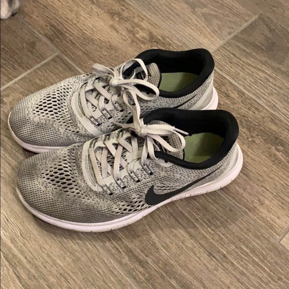 Gray Nike free runs